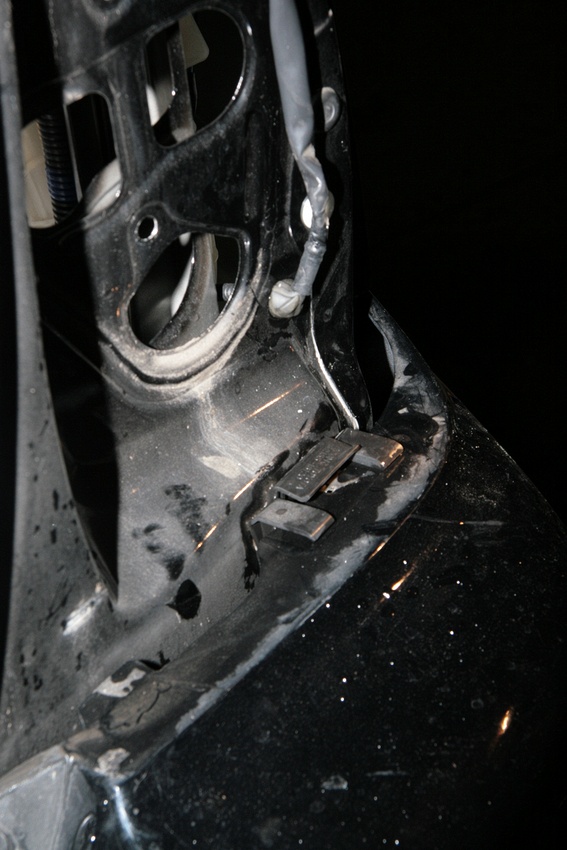 Tail light off...note seam separation above bumper clip