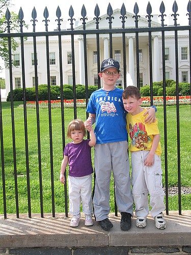The kids pose in front of The White House