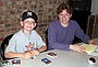 Linda and Joe look up from baseball card trading
