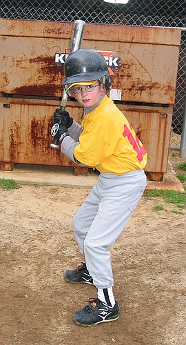 Joe shows off his stance in the on-deck cage