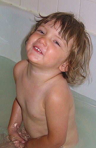 Jay smiles in the bath