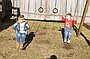 Tyler and Jen play on the swings