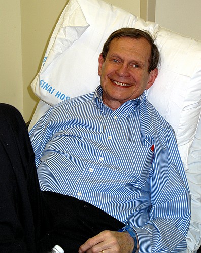 Papa lies down to rest at Jay's party