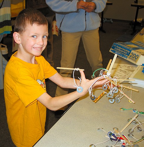 Jennifer poses at <a href="http://www.bcsc.org/">Buehler Challenger & Science Center</a> with some experiment