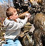 Jennifer climbs the Alice in Wonderland statue in Central Park