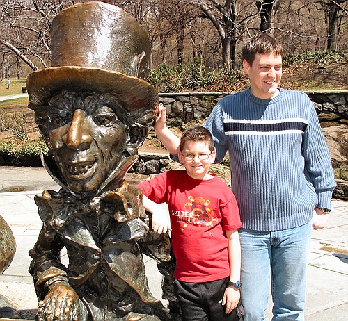 Joe and Uncle Steve lean on the Mad Hatter