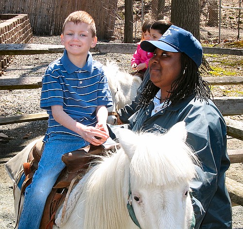Jennifer enjoys a pony ride