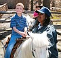 Jennifer enjoys a pony ride