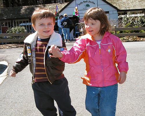 Ethan and Jay running through the park