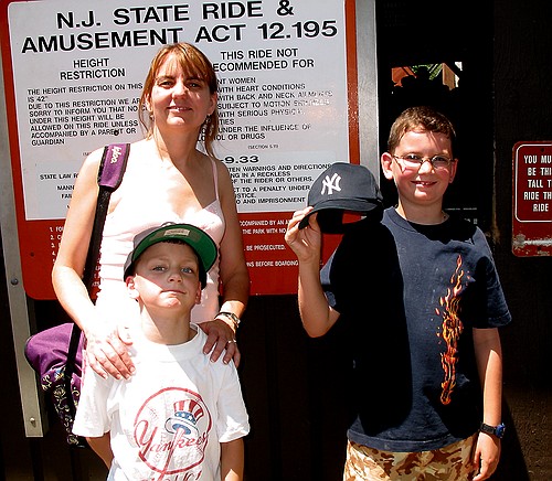 Shana, Joe and Jennifer pose by a ride at Great Adventure