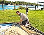 Mark setting up the tent with help from Jennifer