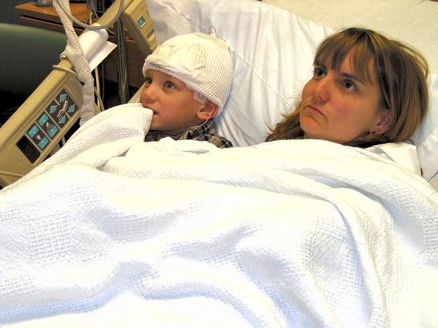 Shana and Jennifer watch TV in the hospital