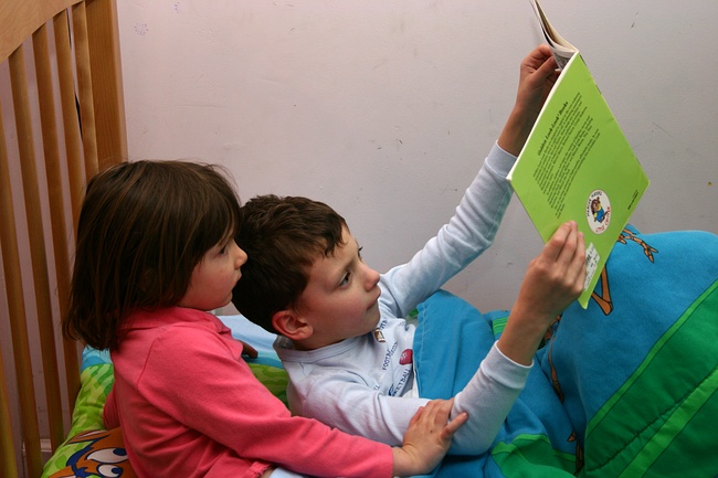 Jennifer reading a story to Jay